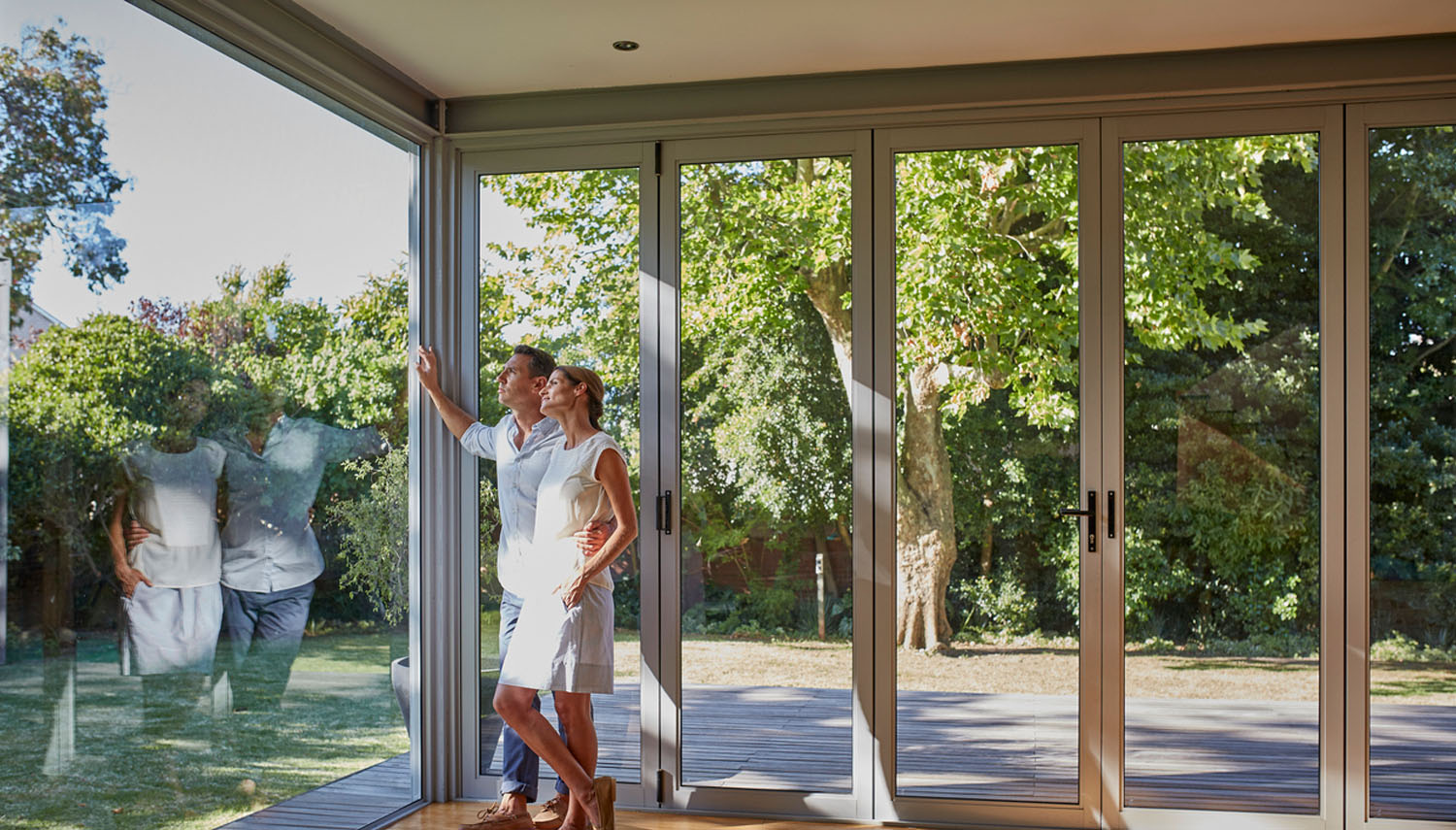 Couple looking at clean windows